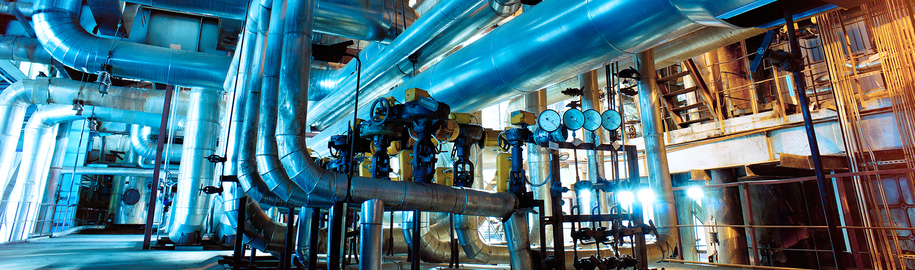 Manufacturing Insurance: Inside an industrial zone, filled with pipes